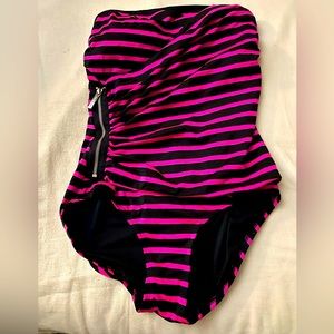 One piece zipper front